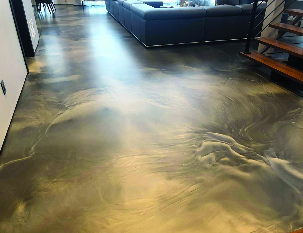 Premium metallic epoxy floor coating with silver and blue patterns