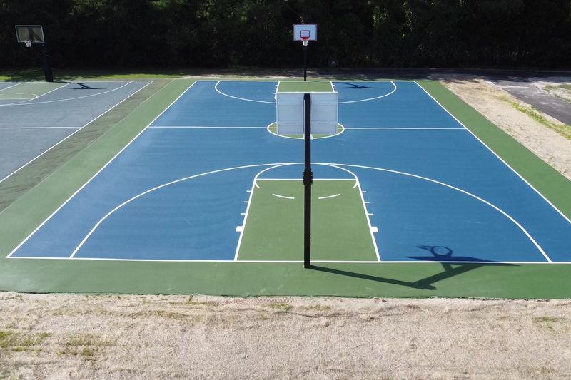 Aerial of both finished courts from the end line