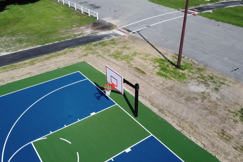Angled aerial of the finished courts and goals