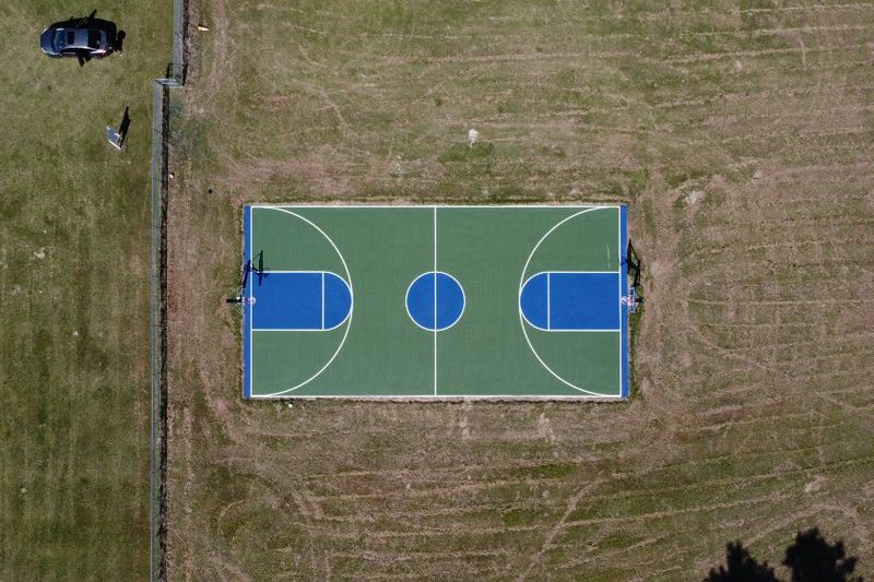 High aerial of the court and fence line