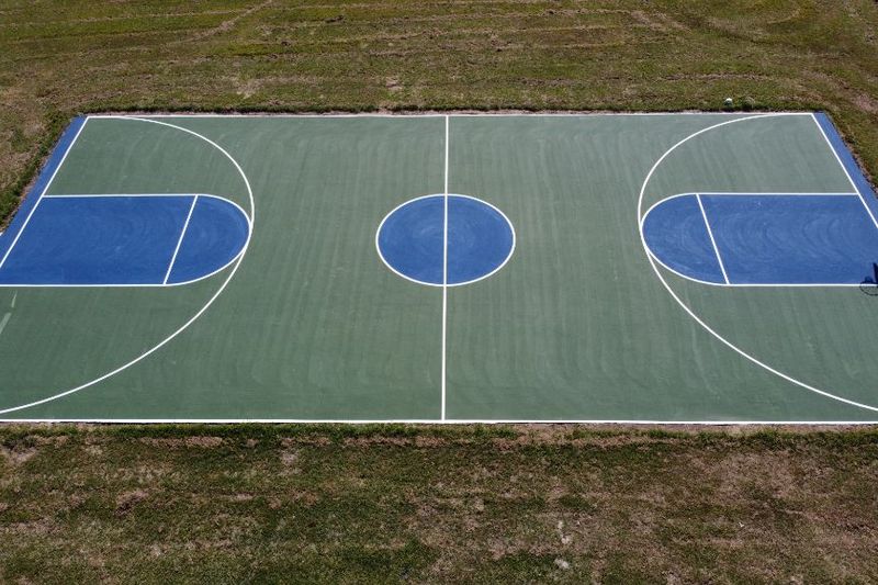 Angled aerial of the full court with both goals