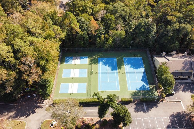 High aerial of the complex and surrounding neighborhood