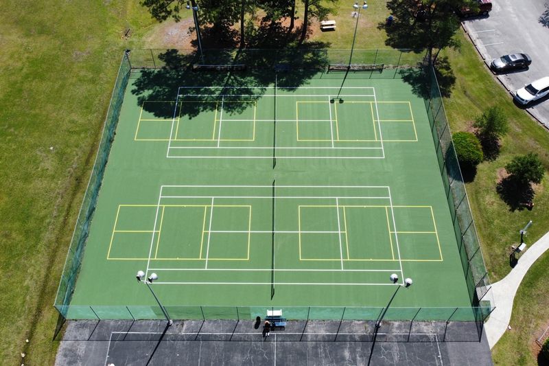 Aerial of the resurfaced courts from the far corner